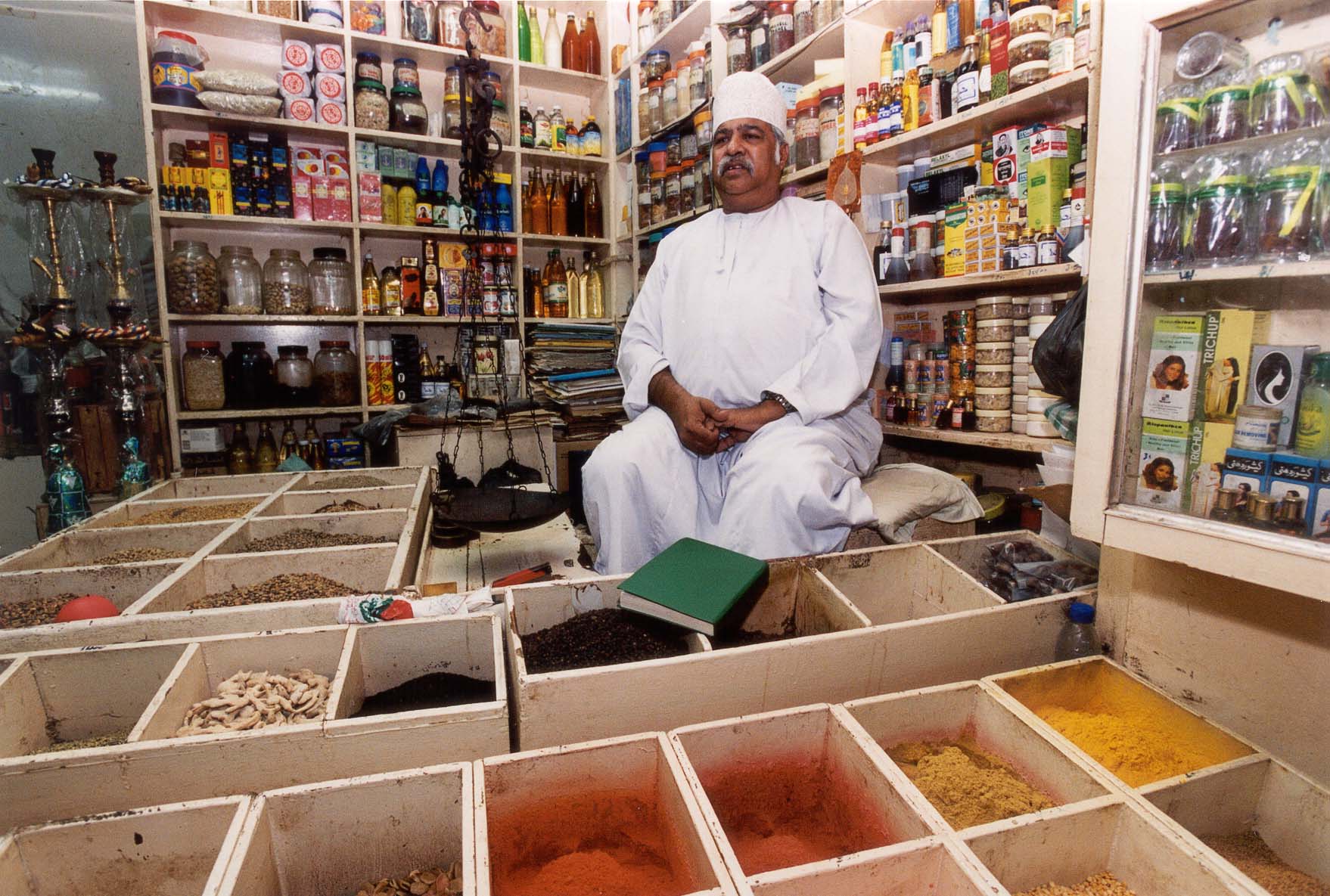 تاجر عطاره في متجره المليء بالأعشاب والحبوب والبهارات ومواد اخرى مختلفه, Electronic Village, His excellency mohammed ahmed khalifa al suwaidi, Arabic Poetry, Arabic Knowledge, arabic articles, astrology, science museum, art museum,goethe museum, alwaraq, arab poet, arabic poems, Arabic Books,Arabic Quiz, القرية الإلكترونية  , محمد أحمد خليفة السويدي  , محمد أحمد  السويدي ,  محمد    السويدي ,  محمد  سويدي , mohammed al suwaidi, mohammed al sowaidi,mohammed suwaidi, mohammed sowaidi, mohammad alsuwaidi, mohammad alsowaidi, mohammed ahmed alsuwaidi, محمد السويدي , محمد أحمد  السويدي , muhammed alsuwaidi,muhammed suwaidi 