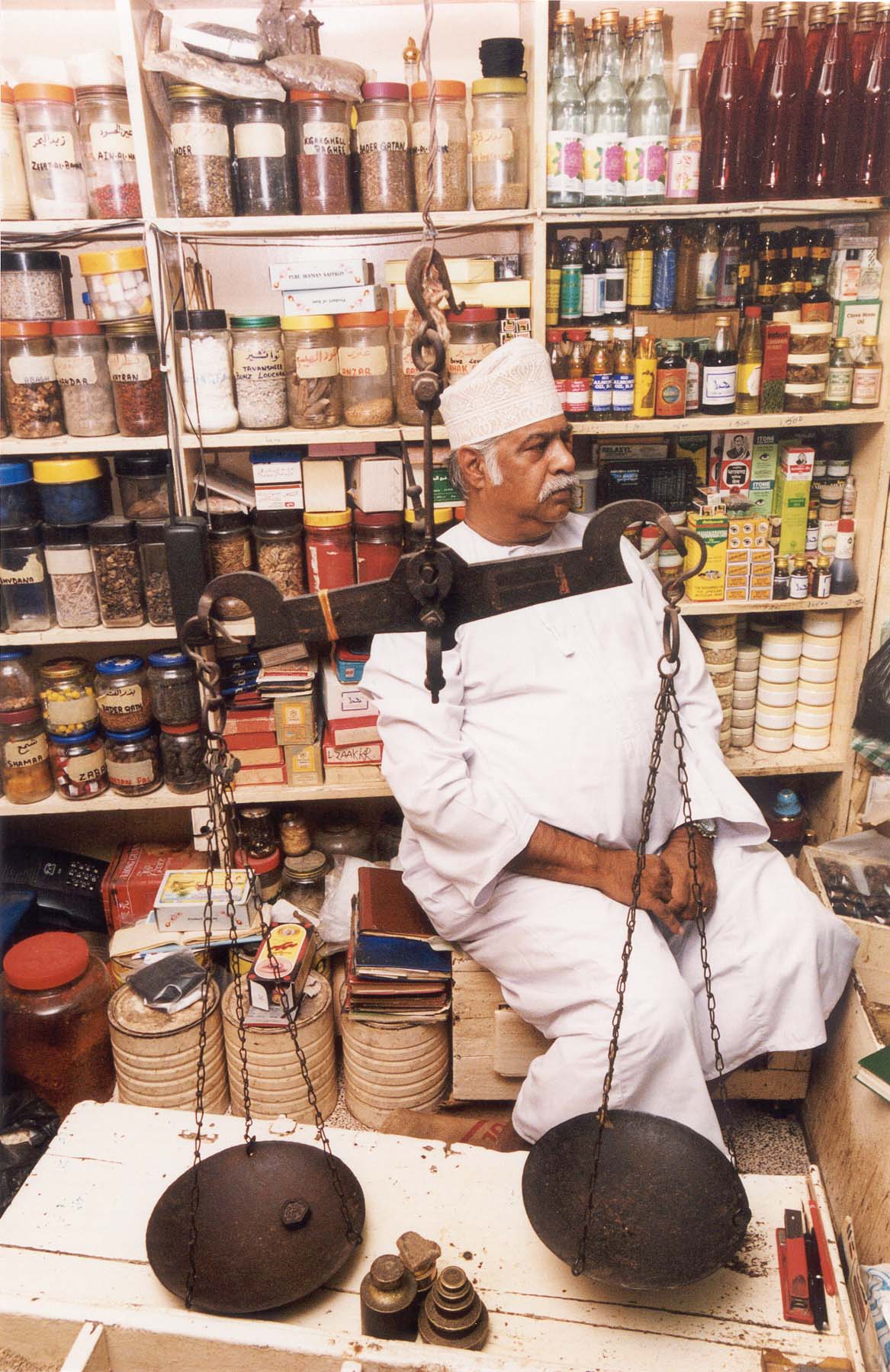 تاجر عطاره في متجره المليء بالأعشاب والحبوب والبهارات ومواد اخرى مختلفه, Electronic Village, His excellency mohammed ahmed khalifa al suwaidi, Arabic Poetry, Arabic Knowledge, arabic articles, astrology, science museum, art museum,goethe museum, alwaraq, arab poet, arabic poems, Arabic Books,Arabic Quiz, القرية الإلكترونية  , محمد أحمد خليفة السويدي  , محمد أحمد  السويدي ,  محمد    السويدي ,  محمد  سويدي , mohammed al suwaidi, mohammed al sowaidi,mohammed suwaidi, mohammed sowaidi, mohammad alsuwaidi, mohammad alsowaidi, mohammed ahmed alsuwaidi, محمد السويدي , محمد أحمد  السويدي , muhammed alsuwaidi,muhammed suwaidi 