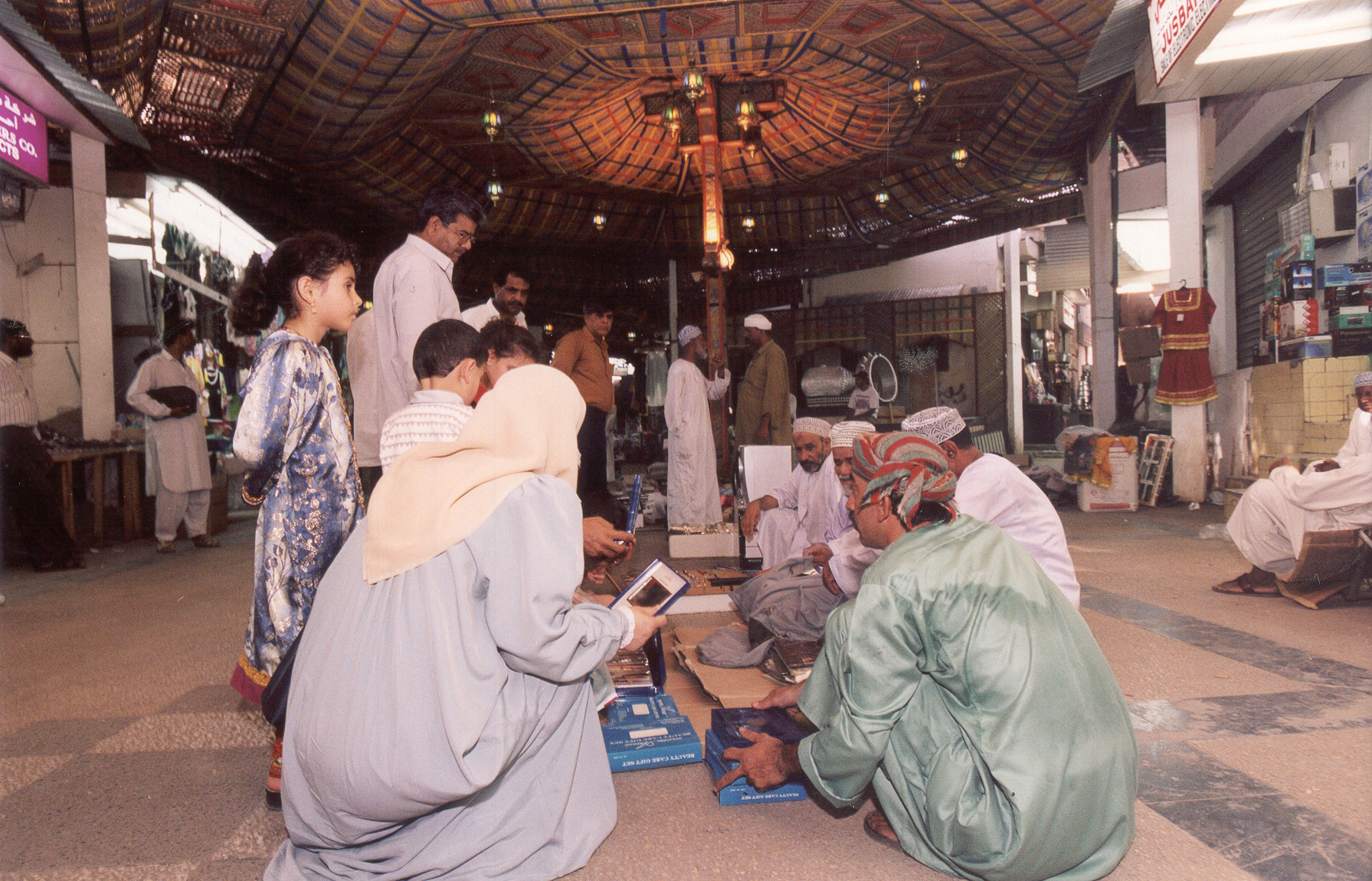 بائع بخور من صلاله تحت سقف سوق الظلام المزخرف بالخشب والألوان, Electronic Village, His excellency mohammed ahmed khalifa al suwaidi, Arabic Poetry, Arabic Knowledge, arabic articles, astrology, science museum, art museum,goethe museum, alwaraq, arab poet, arabic poems, Arabic Books,Arabic Quiz, القرية الإلكترونية  , محمد أحمد خليفة السويدي  , محمد أحمد  السويدي ,  محمد    السويدي ,  محمد  سويدي , mohammed al suwaidi, mohammed al sowaidi,mohammed suwaidi, mohammed sowaidi, mohammad alsuwaidi, mohammad alsowaidi, mohammed ahmed alsuwaidi, محمد السويدي , محمد أحمد  السويدي , muhammed alsuwaidi,muhammed suwaidi 